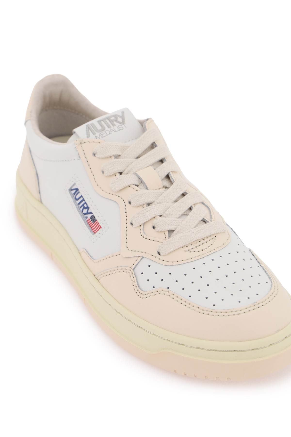 Shop Autry Leather Medalist Low Sneakers In White Denim