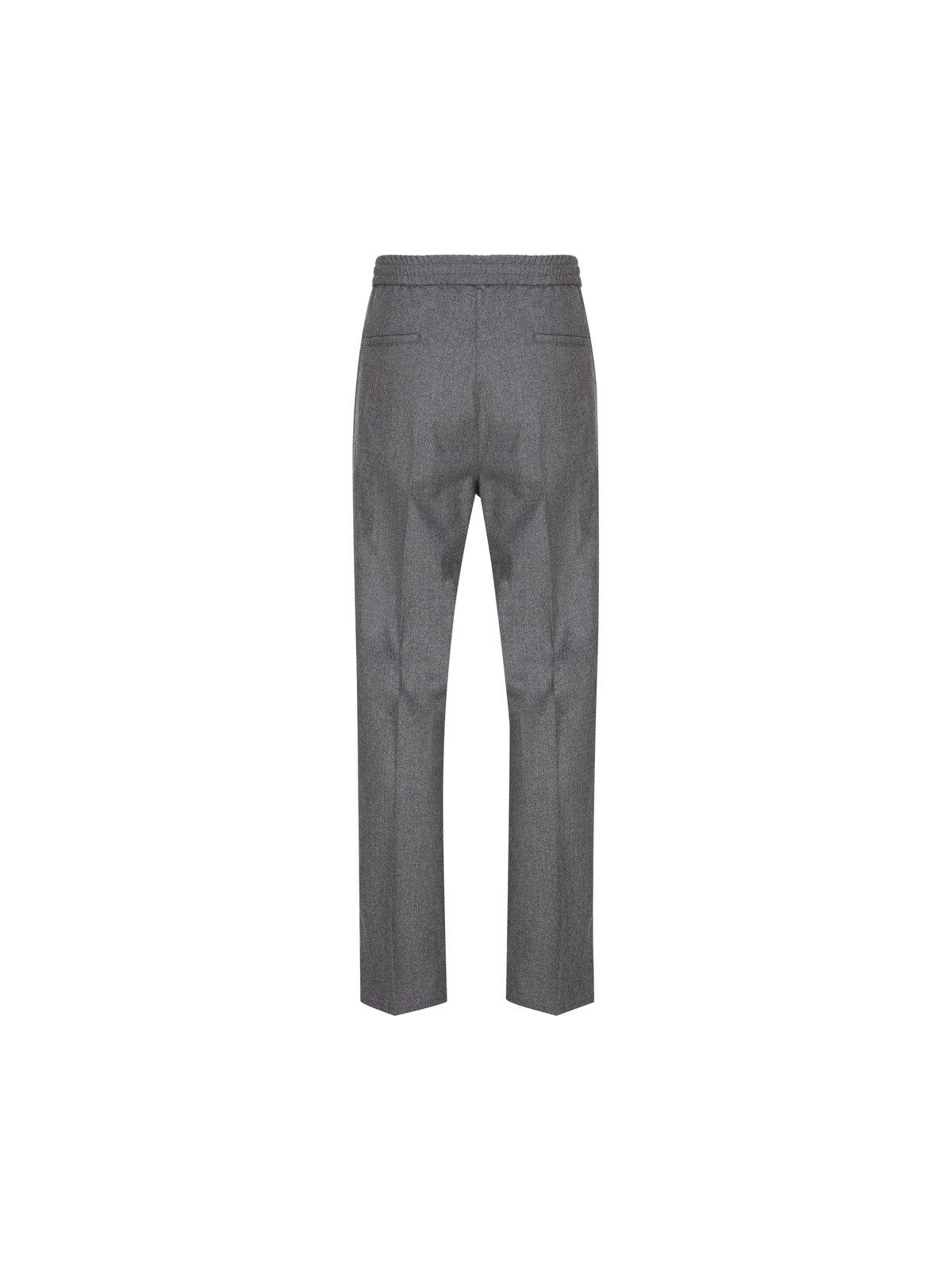 Shop Brunello Cucinelli Pleated Tapered Leg Trousers In Grigio Medio