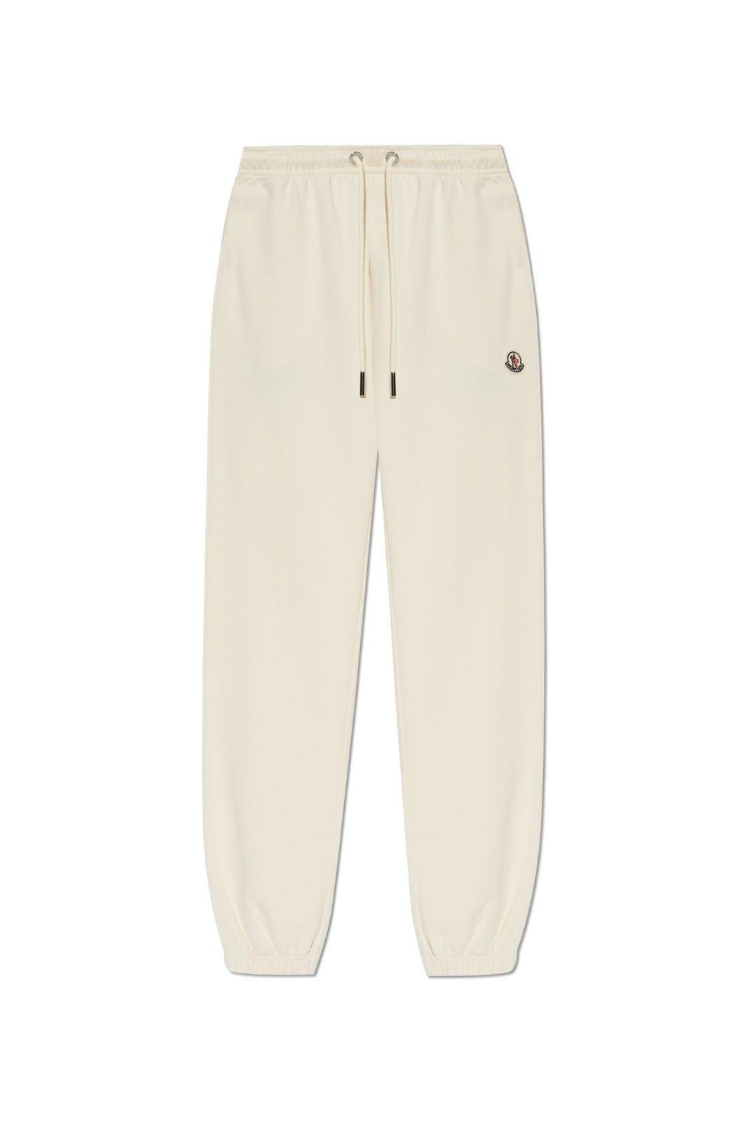 Shop Moncler Logo Patch Drawstring Sweatpants In 034