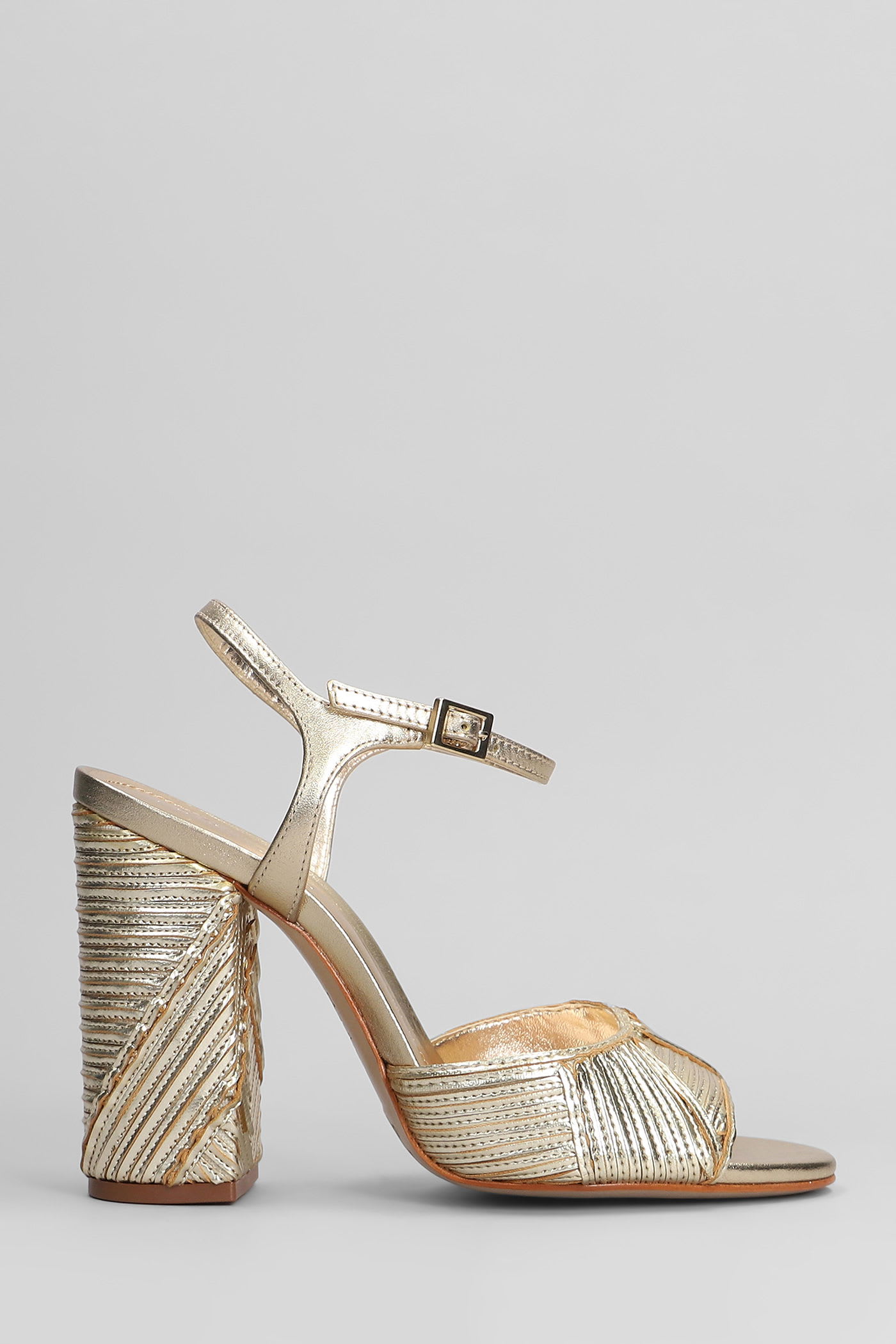 Shop Schutz Lupita Sandals In Gold Leather