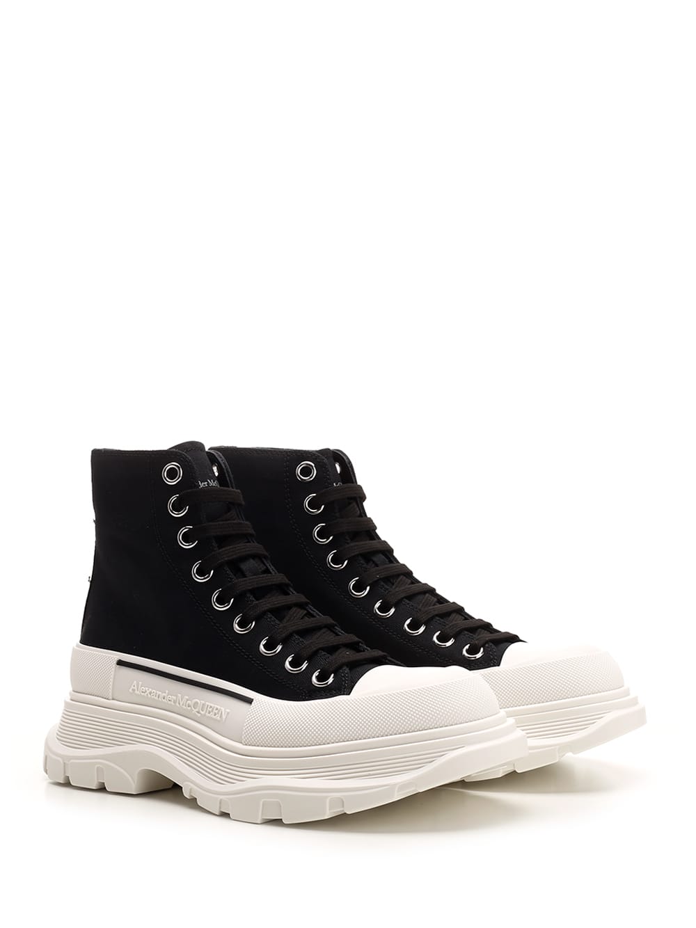 Shop Alexander Mcqueen Tread Slick Ankle Boot In Black