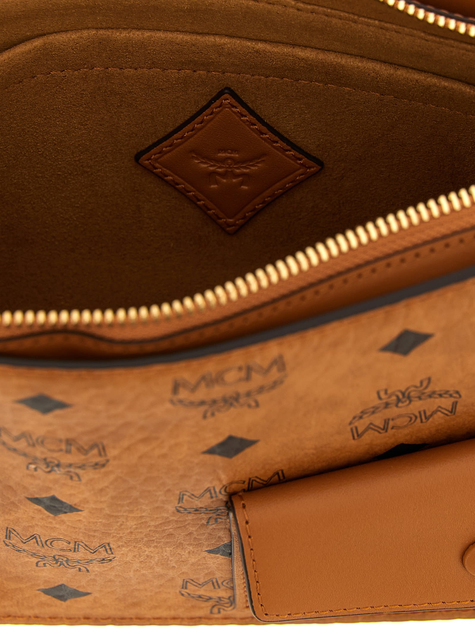 Mcm Shoulder Bags With Adjustable Strap And Front Pocket In Brown