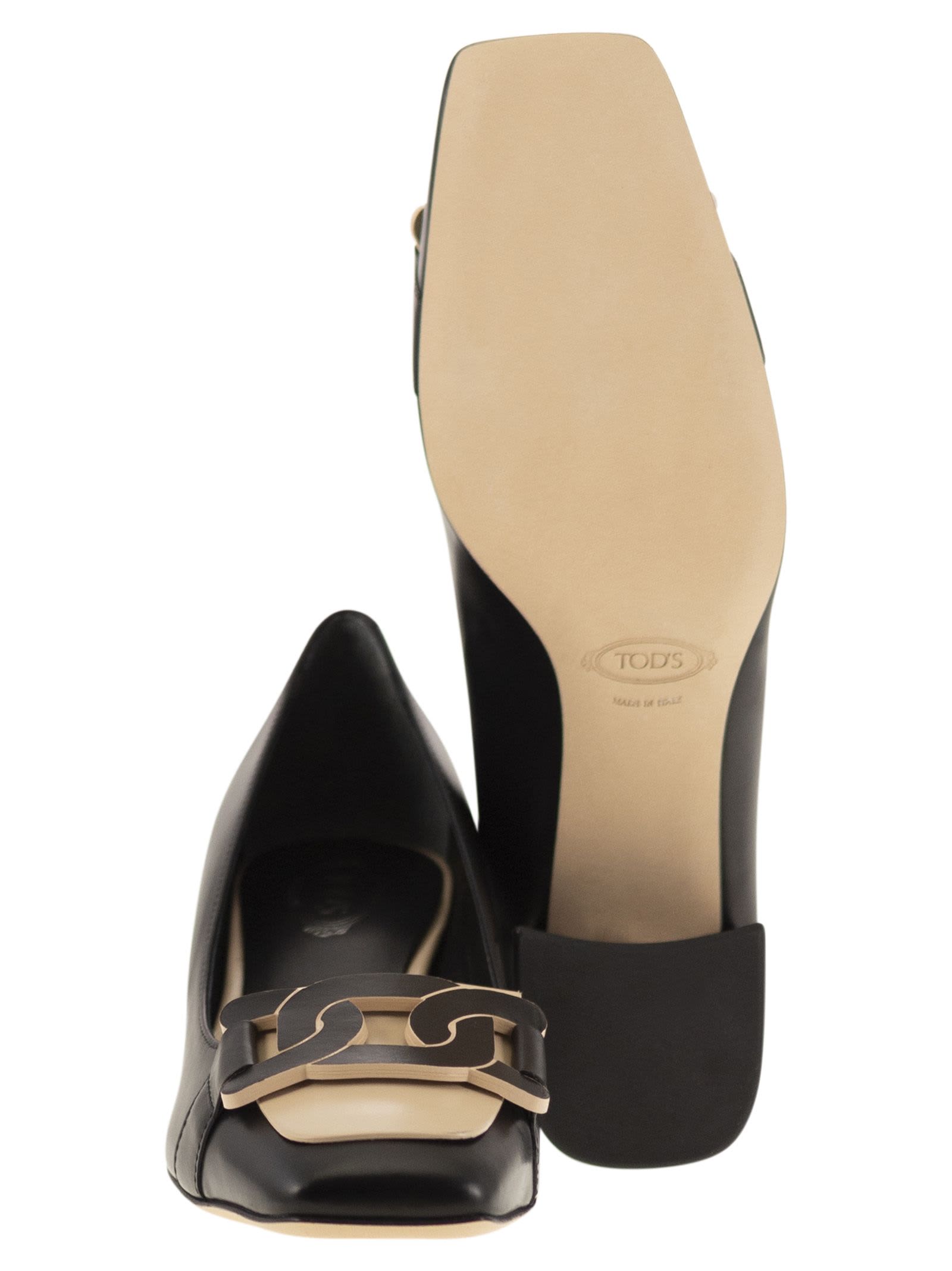 Shop Tod's Leather Pumps With Chain In Black