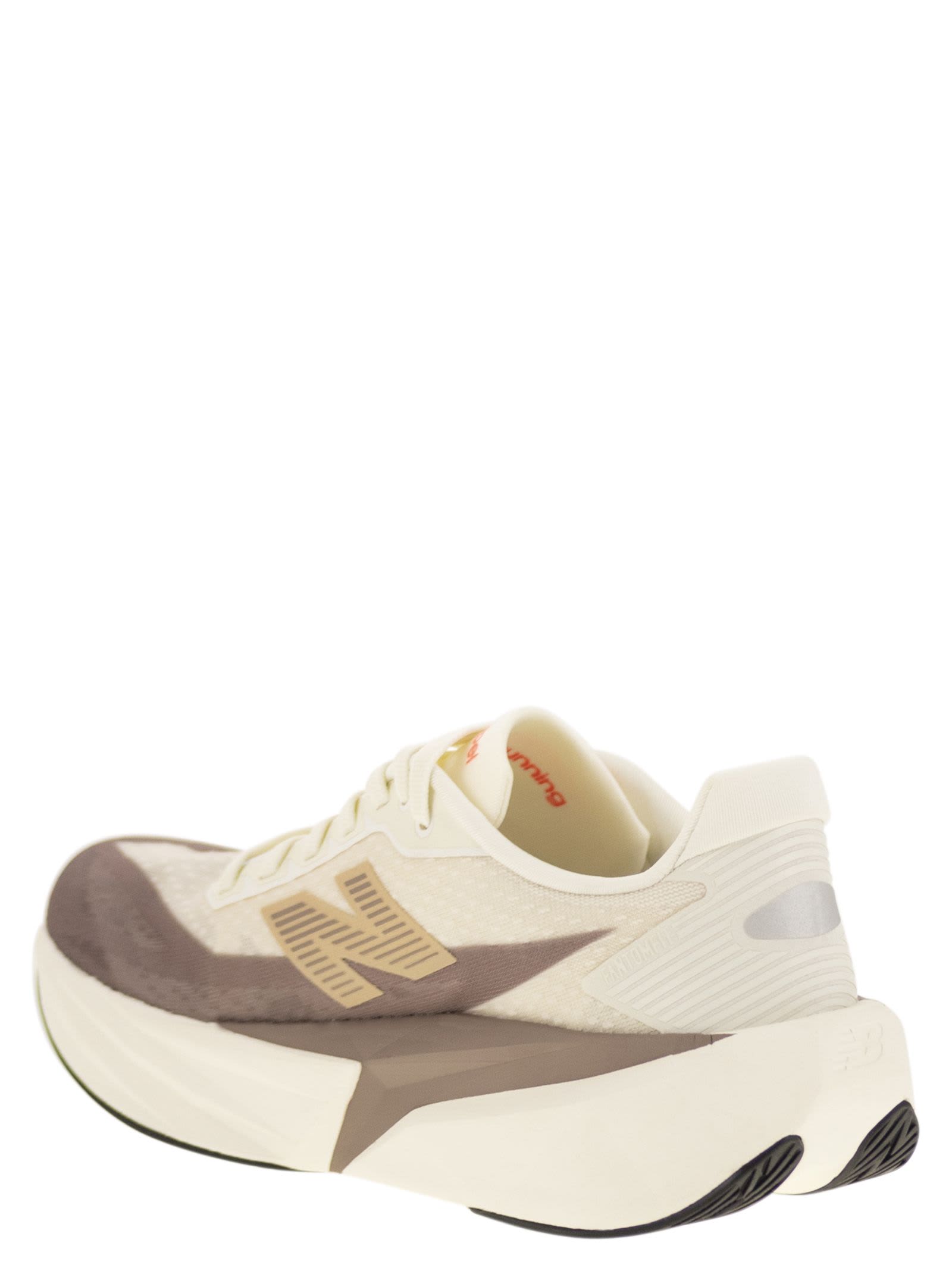 New Balance Fuelcell Rebel V5 Logo-print Sneakers In Brown