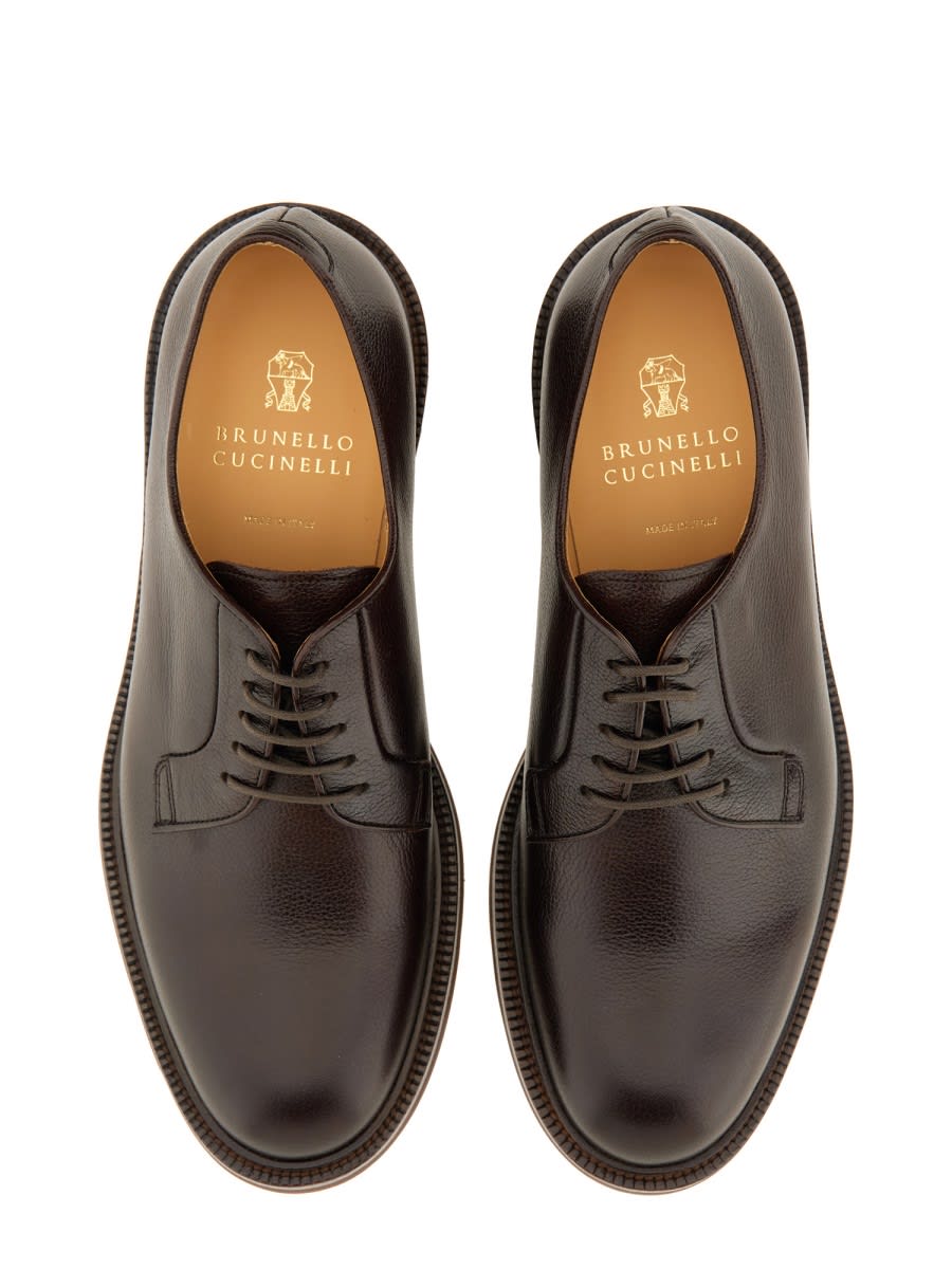 Shop Brunello Cucinelli Leather Derby. In Brown