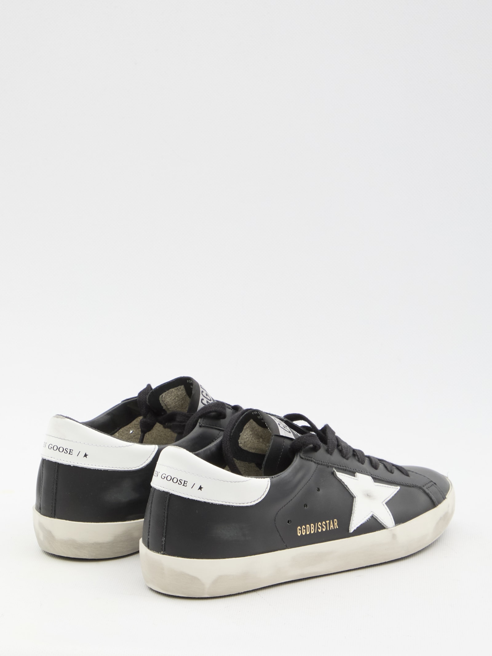 Shop Golden Goose Super-star Sneakers In Black