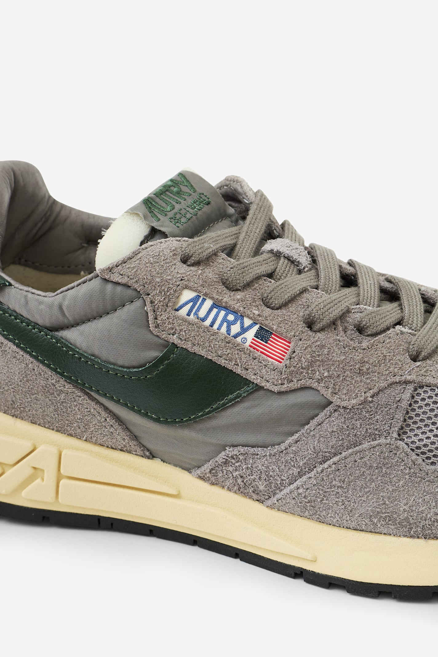 Autry Low-top Sneakers With Mesh Panels And Suede Overlays In Gray