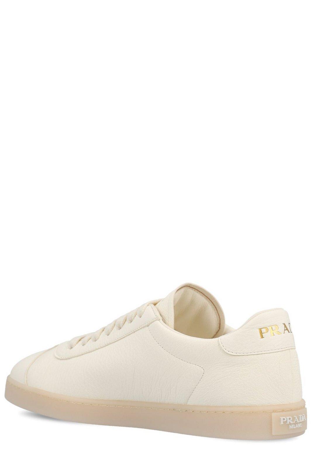 Shop Prada Triangle Logo Plaque Low-top Sneakers In Ivory
