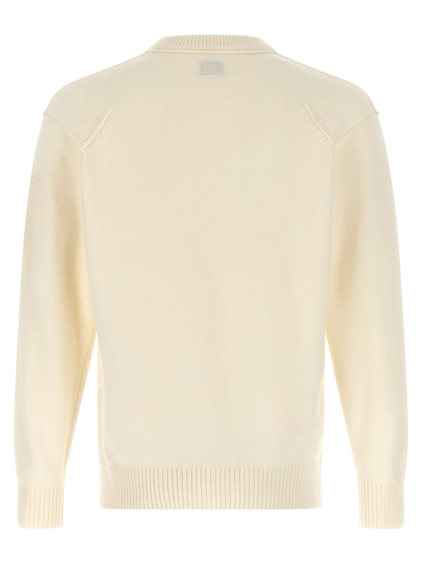 C.p. Company Men White Crewneck Sweater With Logo Plaque On The Sleeve In Wool Blend Man In Neutral