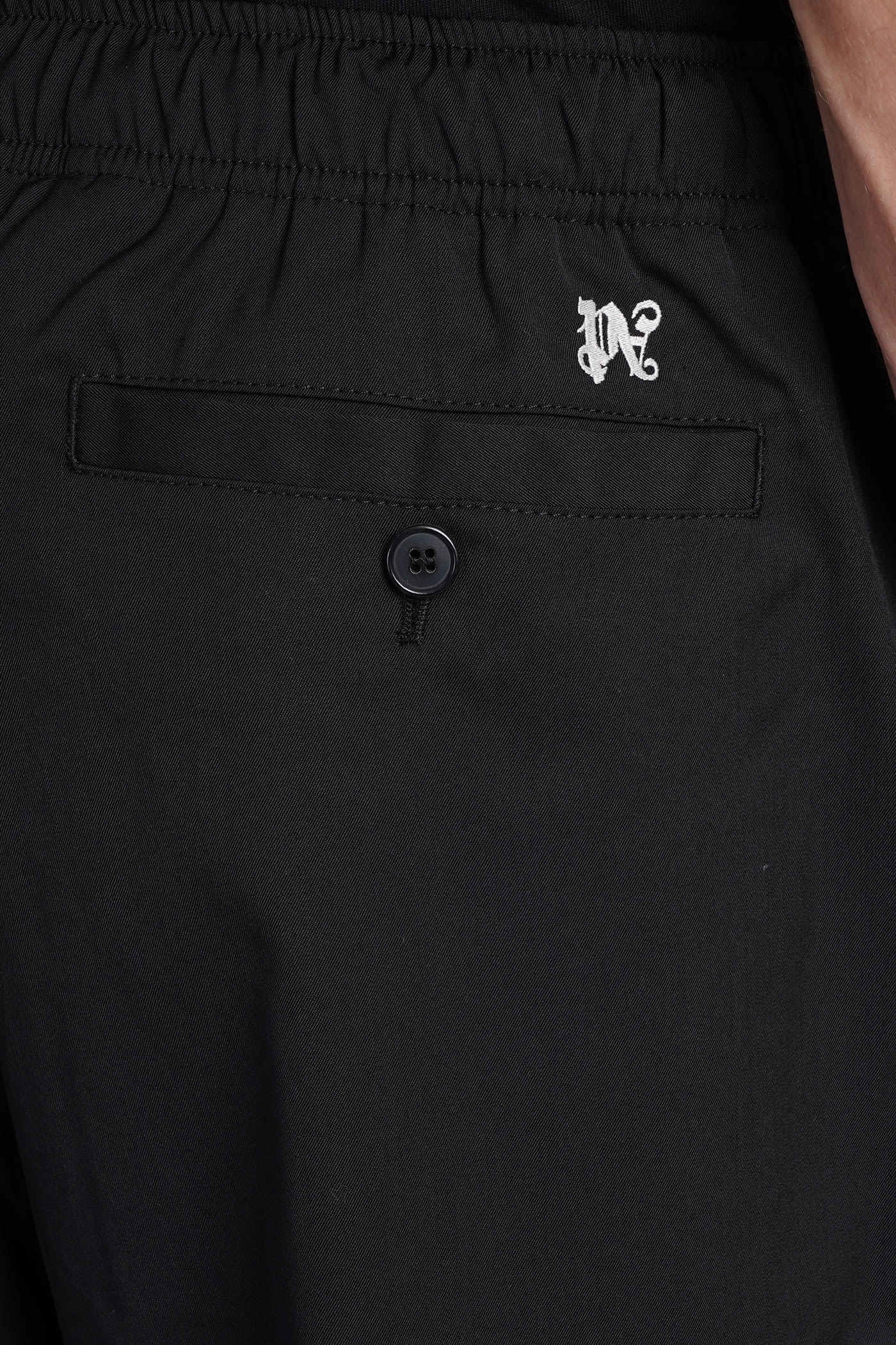 Trousers Shorts Palm Angels - Monogram cotton track pants -  PMCJ023E23FAB0011003