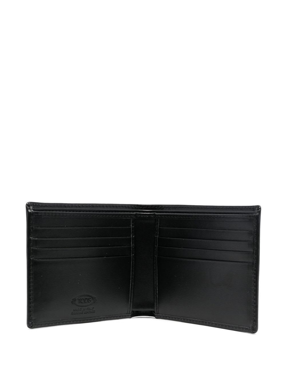 Shop Tod's Wallet In Black